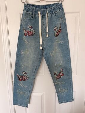 Women's Light Blue Embellished Denim Jeans with Swan Motif